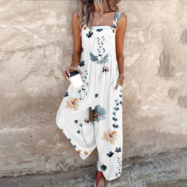 Mono de mujer elegante con estampado floral y pierna ancha