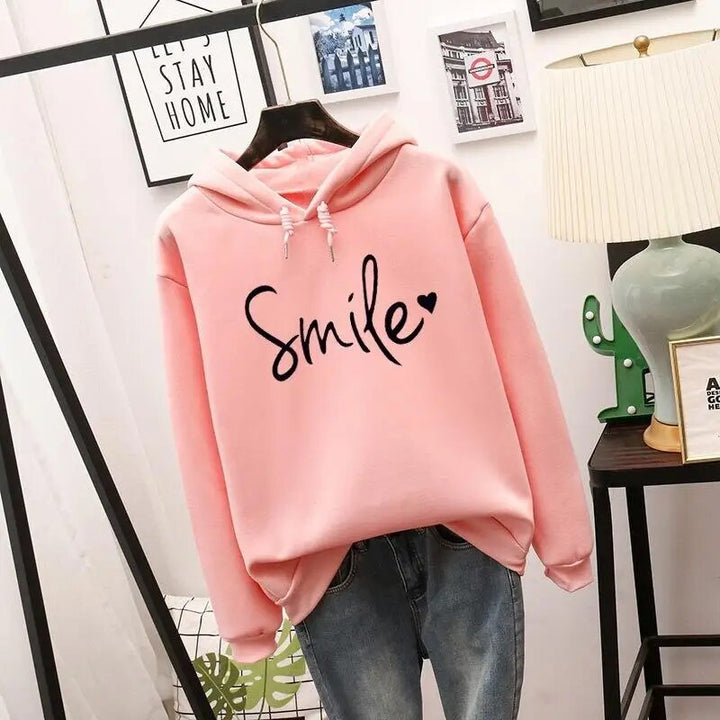 Lucy | Women's Cheerful Cozy Smile Graphic Hoodie-Metro Lane Plaza