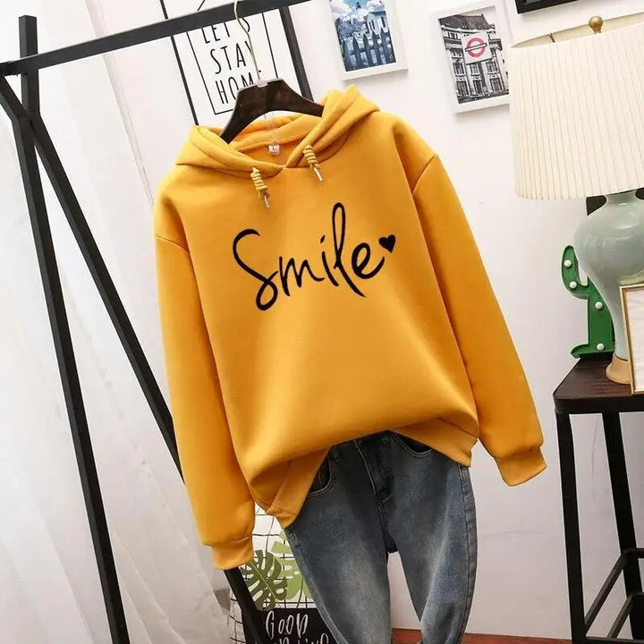 Lucy | Women's Cheerful Cozy Smile Graphic Hoodie-Metro Lane Plaza