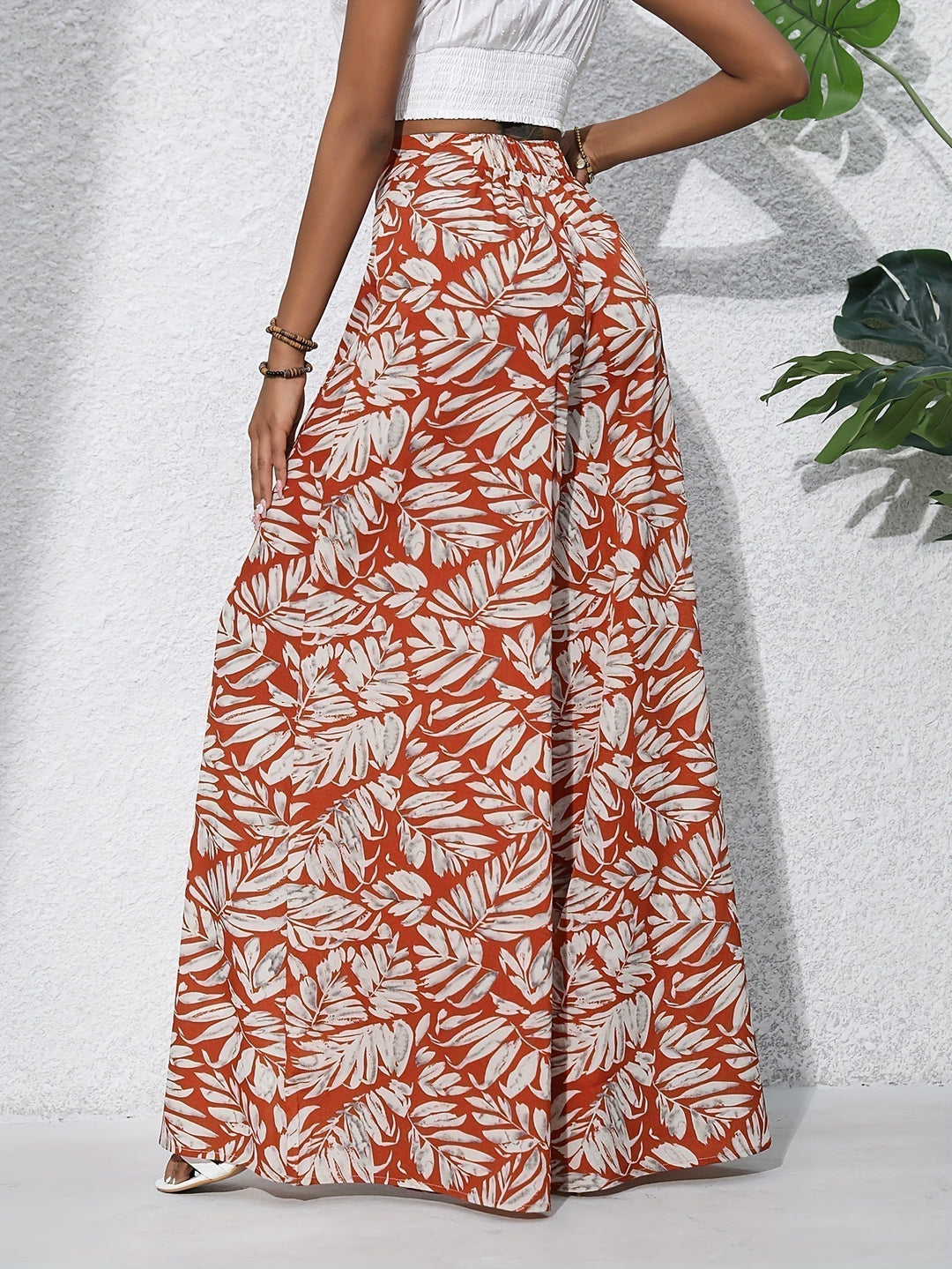 Pantalones palazzo de pierna ancha y cintura alta con estampado floral para mujer