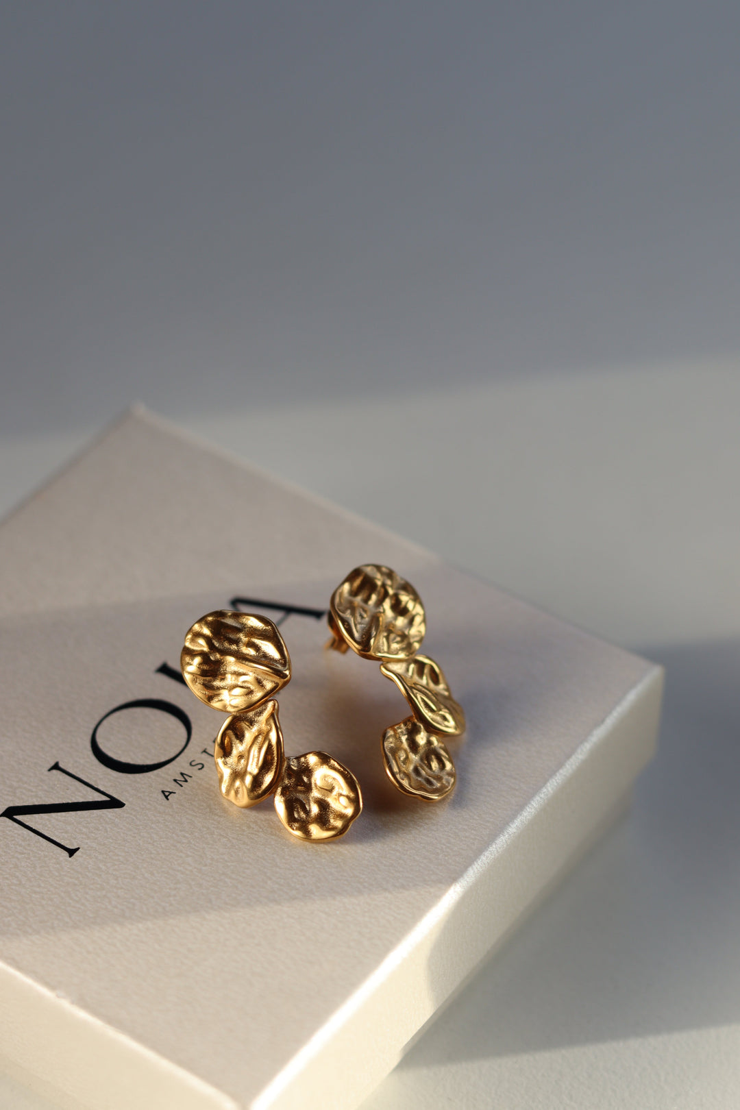 Dila | Women's Gold Sculptural Earrings with Elegant Design-Metro Lane Plaza