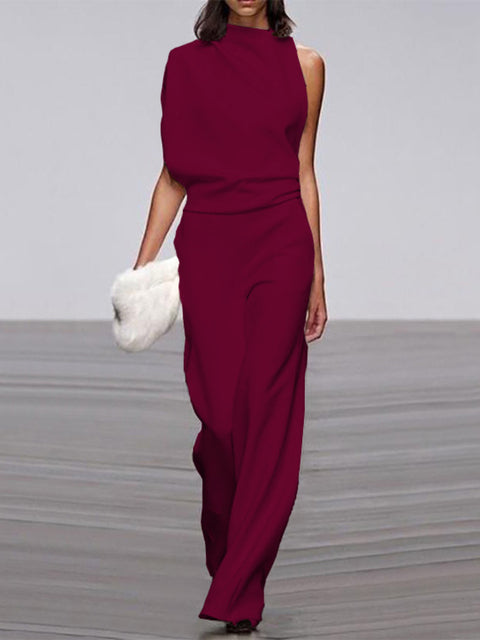 Elegant, ermeløs jumpsuit for kvinner med drapert overdel og vide ben