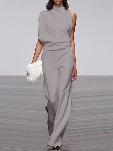Elegant, ermeløs jumpsuit for kvinner med drapert overdel og vide ben