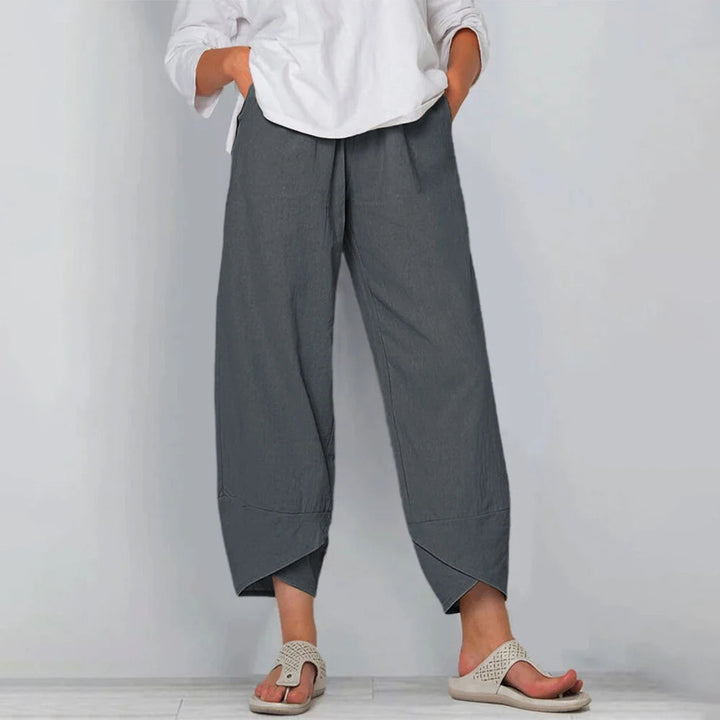 Lockere Leinenhose für Damen mit weitem Bein und asymmetrischem Saum