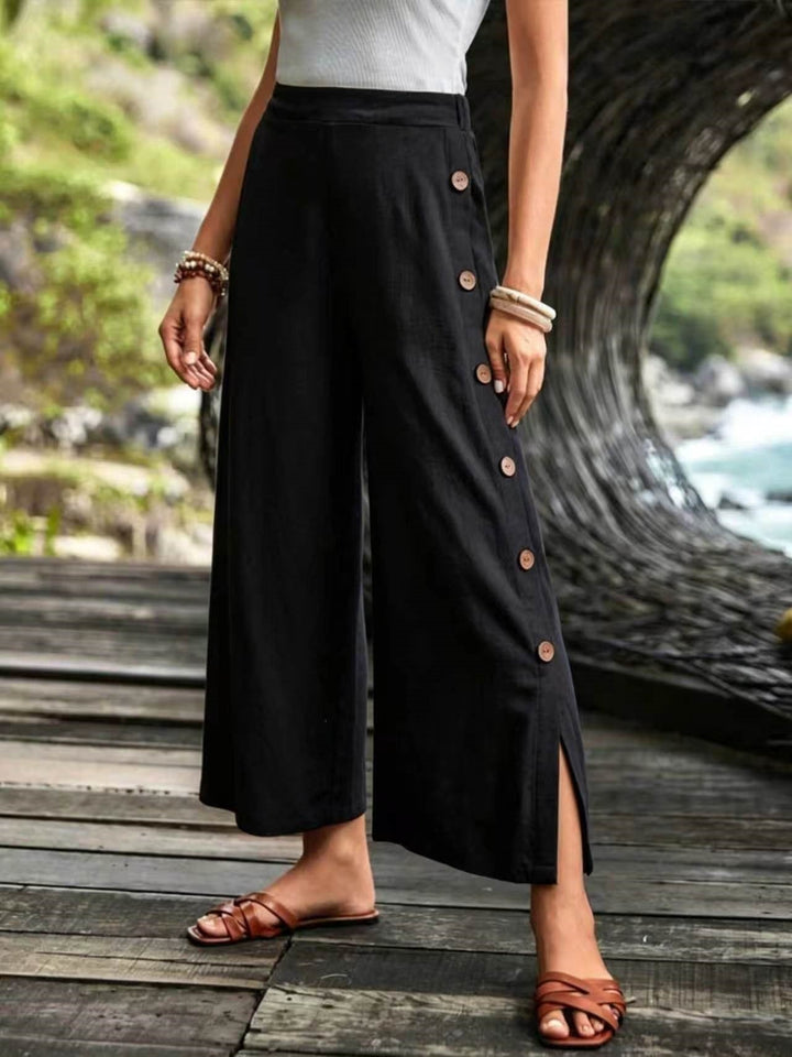 Pantalones de lino de pierna ancha y corte relajado para mujer con detalle de botones