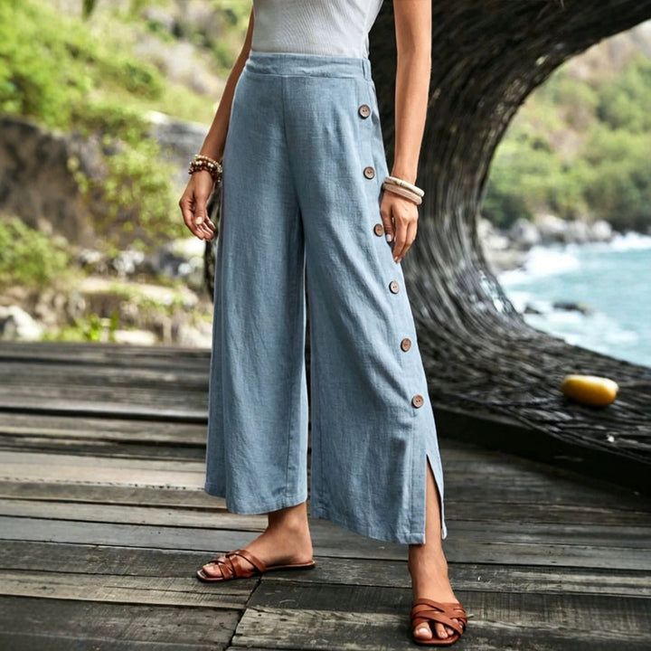 Pantalones de lino de pierna ancha y corte relajado para mujer con detalle de botones