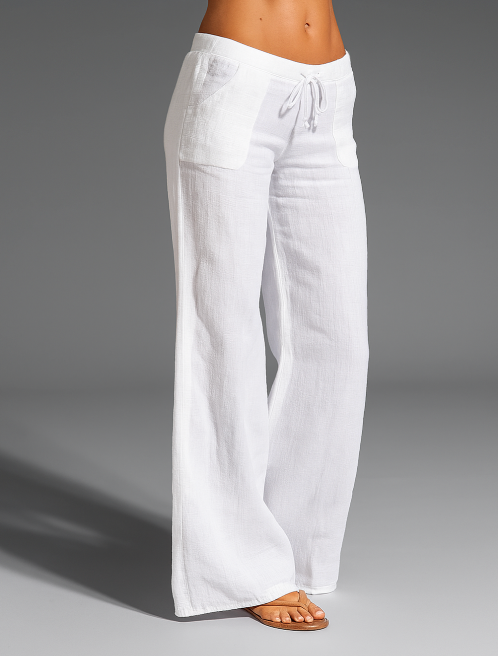 Pantalones de lino de pierna ancha y corte relajado para mujer con cintura ajustable