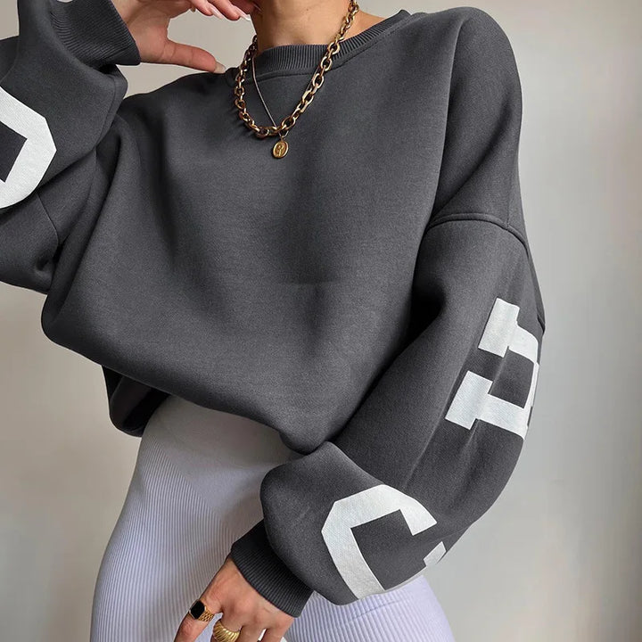 Oversize-Damen-Sweatshirt mit Rundhalsausschnitt und Ärmeln mit Grafikprint