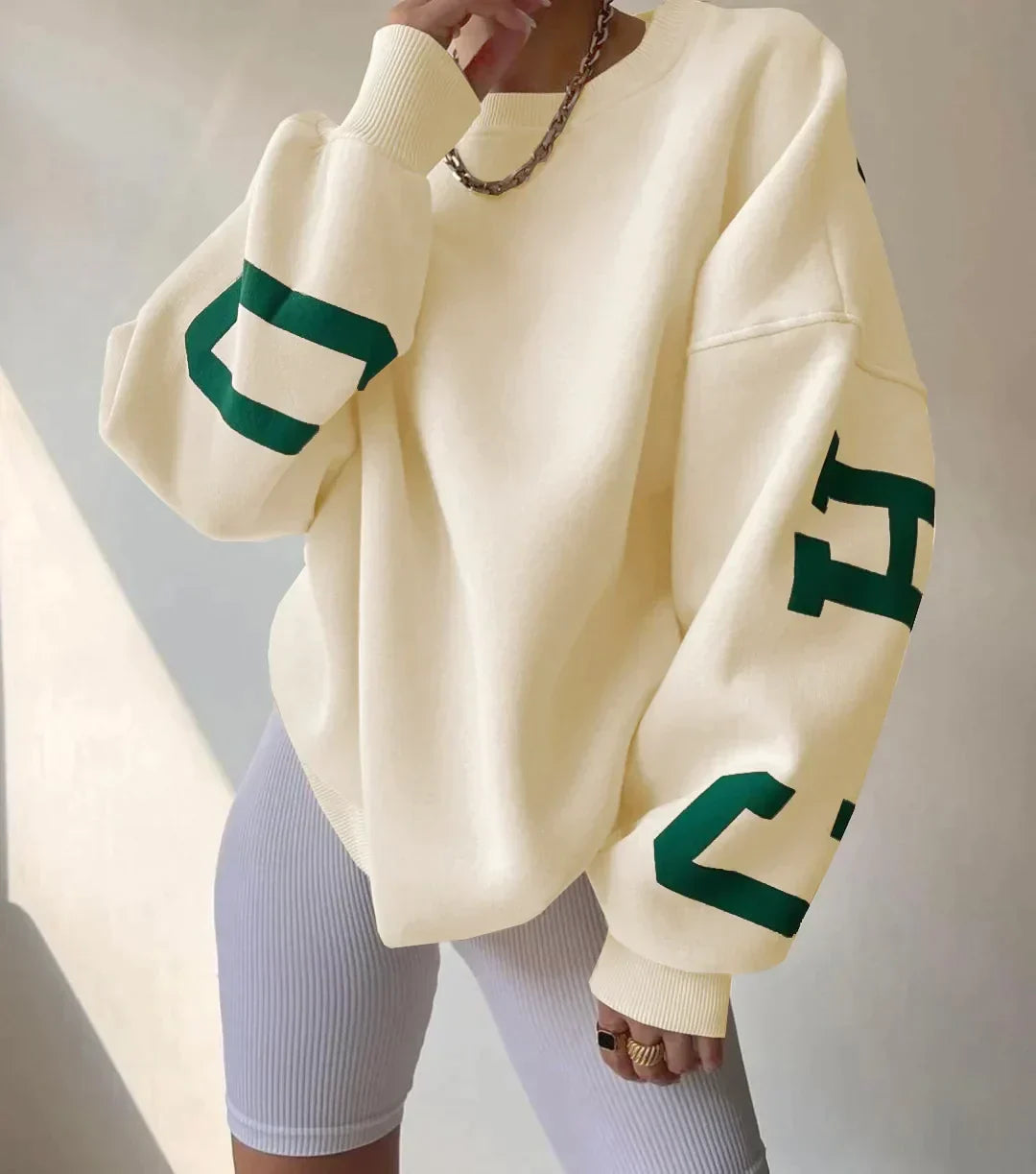 Oversize-Damen-Sweatshirt mit Rundhalsausschnitt und Ärmeln mit Grafikprint