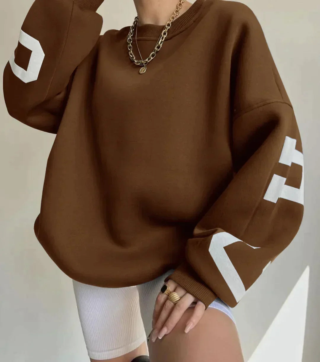 Oversize-Damen-Sweatshirt mit Rundhalsausschnitt und Ärmeln mit Grafikprint