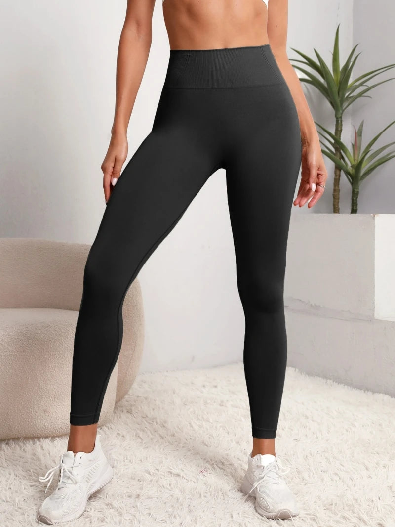 Leggings de ioga de cintura subida, sem costuras e com efeito lifting nas ancas, para mulher