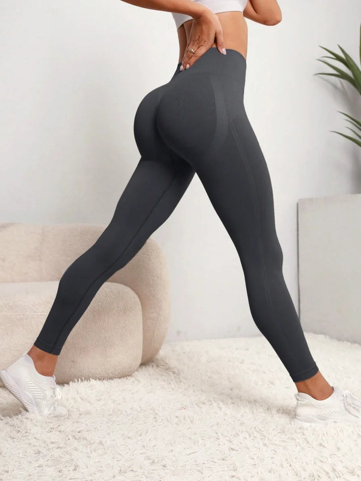 Leggings de ioga de cintura subida, sem costuras e com efeito lifting nas ancas, para mulher