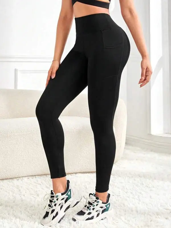 Ensfarvede sømløse yogaleggings med høj talje og lommer til kvinder
