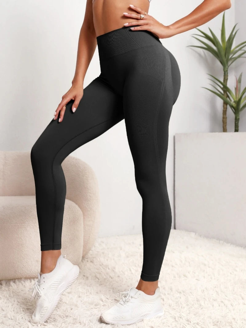 Leggings de ioga de cintura subida, sem costuras e com efeito lifting nas ancas, para mulher