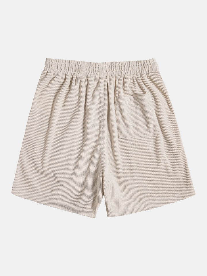 Kortärmad skjorta med knappar och shorts med dragsko för män