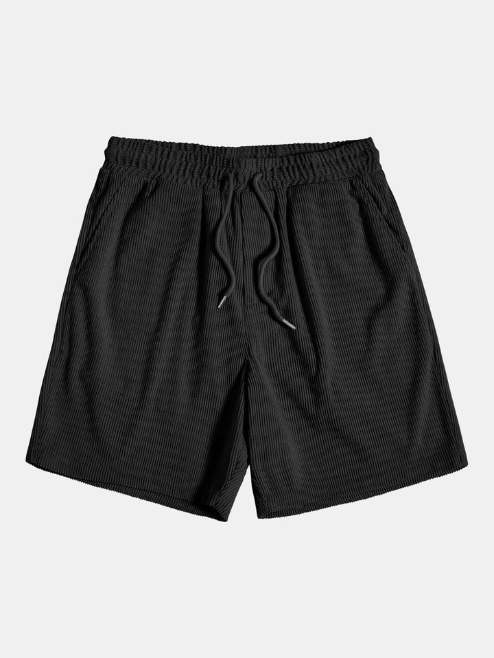 Kortärmad skjorta med knappar och shorts med dragsko för män