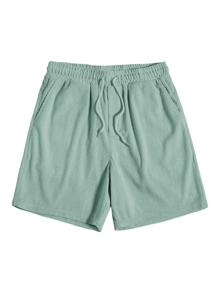 Kortärmad skjorta med knappar och shorts med dragsko för män