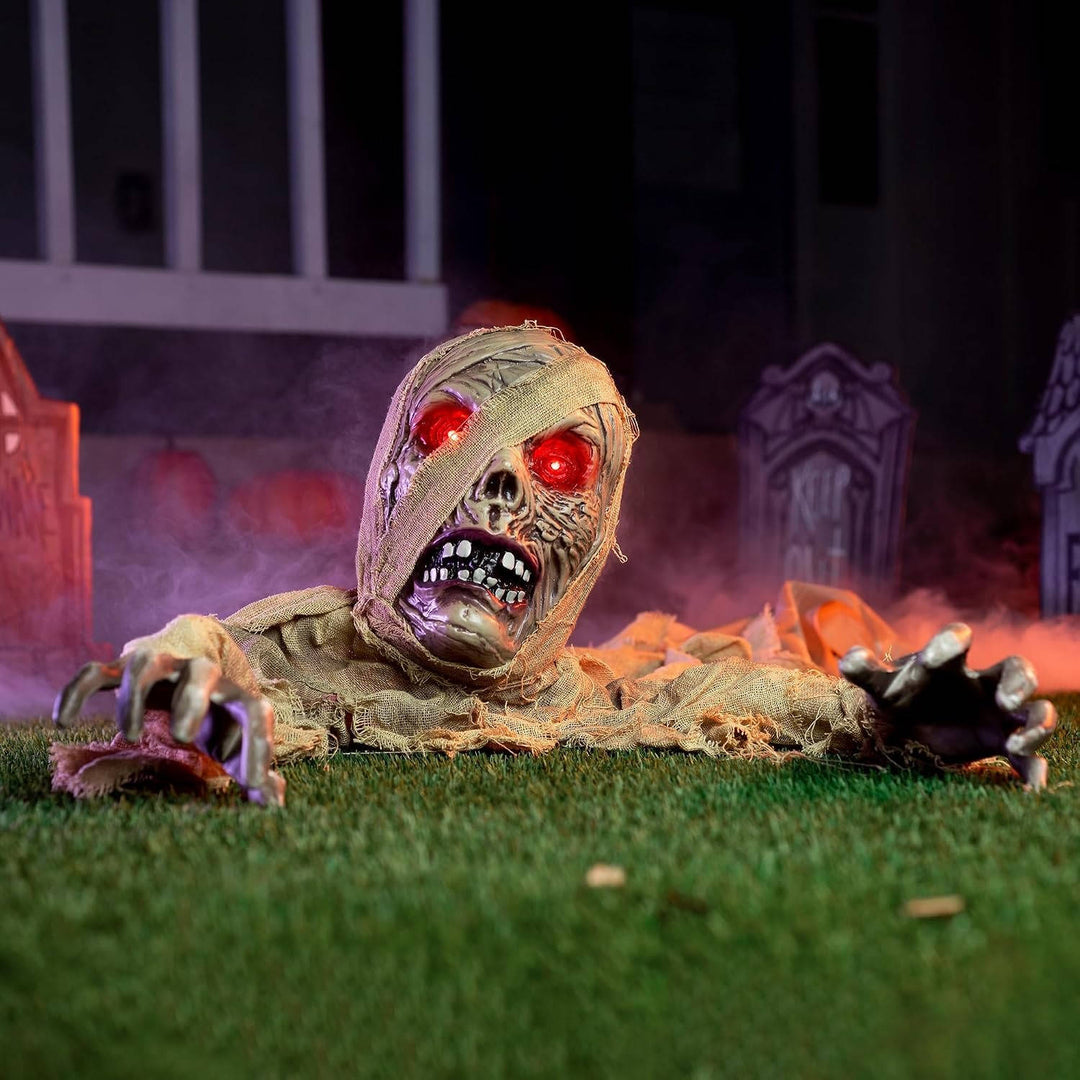 Figura de zombi que emerge del suelo para Halloween, con ojos iluminados y sonido, para mujer