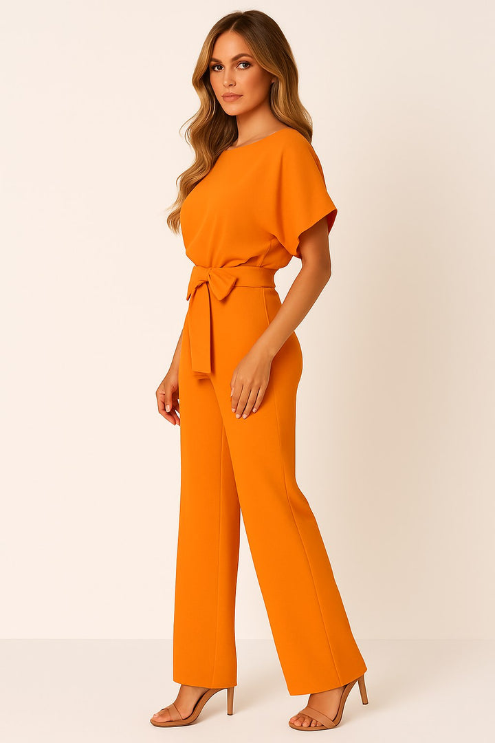 Jumpsuit i pontejersey med flagermusærmer til kvinder