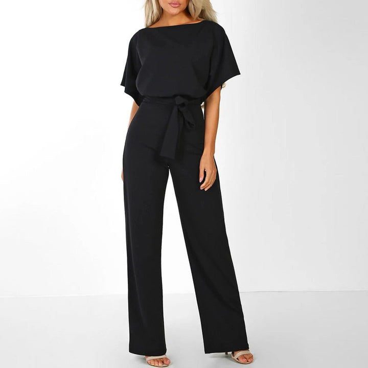 Damjumpsuit med knytning framtill och fladdermusärmar